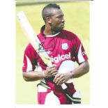 Andre Russell Signed West Indies Cricket 8x12 Photo. Good Condition. All autographs are genuine hand