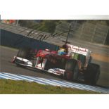 Formula 1 Felipe Massa Grand Prix racing driver signed Ferrari car in action photo. Comes with COA