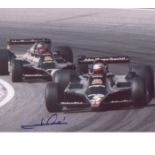 Mario Andretti signed 10 x 8 inch photo. during F1 race. Good Condition. All autographs are