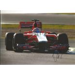 Formula 1 Timo Glock Grand Prix racing driver signed Virgin racing car in action photo. Comes with