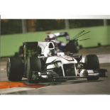 Formula 1 Nick Heidfeld Grand Prix racing driver signed Sauber car in action photo. Comes with COA