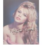 Brigitte Bardot signed 10 x 8 inch photo. Good Condition. All autographs are genuine hand signed and