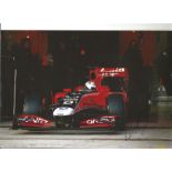 Formula 1 Timo Glock Grand Prix racing driver signed Virgin racing car in action photo. Comes with