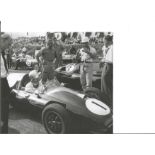 Stirling Moss signed 8 x 8 b/w photo to Doug. Good Condition. All autographs are genuine hand signed
