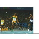 Yohan Blake Signed Athletics Dagu 2011 World Championships 8x10 Photo. Good Condition. All
