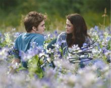 Robert Pattinson and Kristen Stewart signed 10 x 8 colour photo from The Twilight Saga. Good