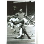 Eusebio Portugal Signed 12 x 8 inch football black and white photo. Good Condition. All autographs