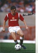 Football Arthur Albiston 12x8 Signed Colour Photo Pictured Playing For Man Utd. Good Condition.