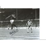 Football Stuart Pearson 10x8 Signed B/W Photo Pictured In Action For Manchester United. Good