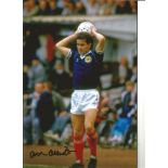 Football Arthur Albiston 12x8 Signed Colour Photo Pictured Playing For Scotland . Good Condition.