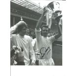 Football Paul Reaney 10x8 Signed B/W Photo Pictured Celebrating After Leeds Victory In The 1972 FA