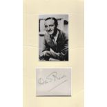 David Niven signed album page mounted with 6 x 4 unsigned b/w portrait photo. Good Condition. All