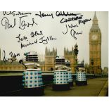 Dr Who Eight actors signed 10 x 8 inch colour Daleks on London Bridge stunning photo. Includes