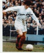 Leeds Utd football legend Eddie Gray signed 10 x 8 inch colour action photo. Good Condition. All