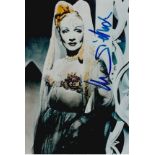 Marlene Dietrich signed 6 x 4 inch colourized portrait photo. Good Condition. All autographs are