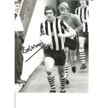 Bobby Moncur 10x8 Signed B/W Photo Pictured Leading Newcastle United Out. Good Condition. All