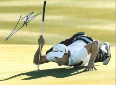 Camilo Villegas Signed 16 x 12 inch golf photo. Good Condition. All autographs are genuine hand