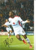Benik Afobe Wimbledon Signed 12 x 8 inch football photo. Good Condition. All autographs are