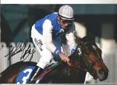 Russell Baze Signed 10 x 8 inch horse racing photo. Good Condition. All autographs are genuine