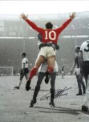 Geoff Hurst 66 England Signed 16 x 12 inch football colour enhanced photo. Good Condition. All