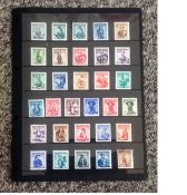 Austrian stamp collection on stock card. 31 stamps. 1948 costumes. Cat value nearly £400. Good