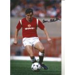 Arthur Albiston 12x8 Signed Colour Photo Pictured Playing For Man Utd. Good Condition. We combine