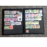 Hong Kong stamp collection on backing paper then arranged on stock card. Good Condition. We