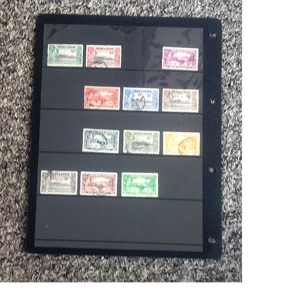 Sierra Leone mint and used stamp collection on stock card. 12 stamps. GVI. Cat value £107. Good - Image 2 of 2