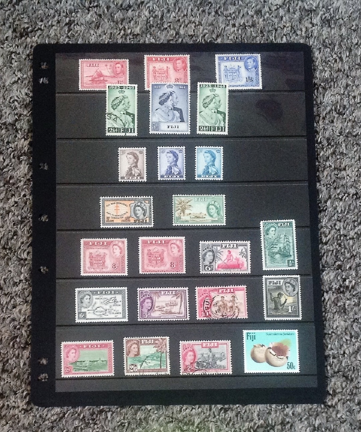 Fiji stamp collection 1 album leave 23 interesting stamps. Good Condition. We combine postage on