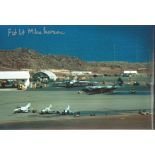 Flt LT Mike Pearson signed 12x10 inch colour photo of airfield with grounded Bomber Planes. Good