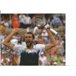 Marin Cilic signed 10x8 colour photo in action celebrating. Good Condition. We combine postage on