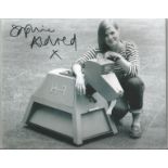 Sophie Aldred signed 10x8 black and white photo from Doctor Who seen here with K9. Good Condition.