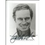 Charlton Heston signed 5x3 black and white photo. Good Condition. We combine postage on multiple