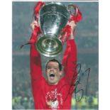 Jamie Carragher signed 10x8 colour photo lifting the Champions league trophy. Good Condition. We