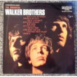 John and Gary Walker signed The Immortal Walker Brothers 33rpm record sleeve. Signed on back