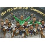 Per Mertesacker & Andre Schurrle Signed Germany 2014 World Cup Winners 8x12 Photo. Good Condition.