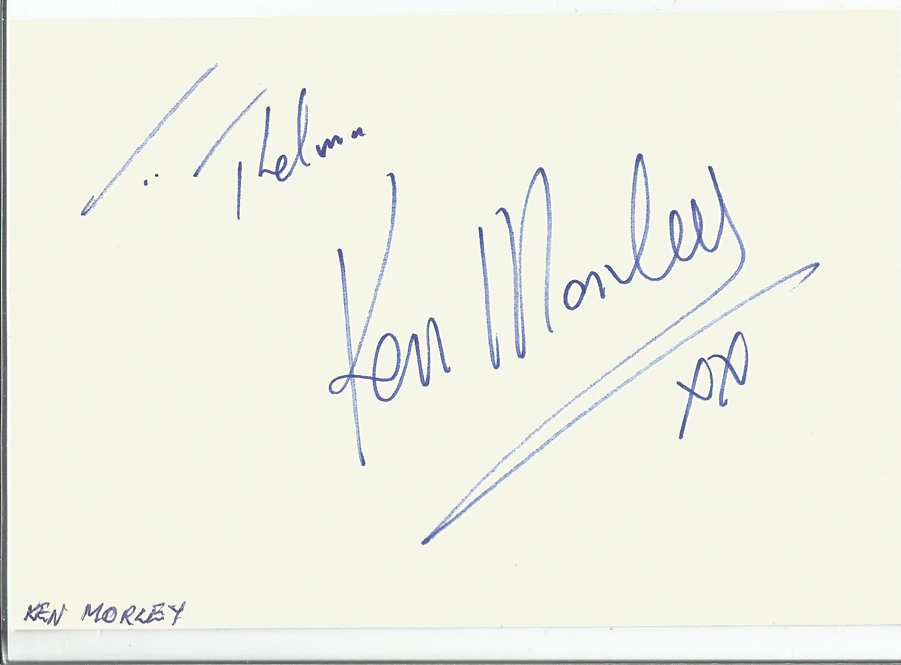 Ken Morley signed album page. English actor and comedian. He is best known for playing the role of