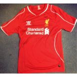 Liverpool shirt signed by Carragher, Gerrard, Smicer & Garcia. Good Condition. We combine postage on
