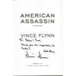 Vince Flynn (the author) signed paperback American Assassin with inscription to John. Advance