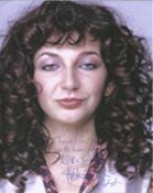 Kate Bush signed 12 x 8 grainy colour portrait photo dedicated to Ian. Good Condition. We combine