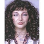 Kate Bush signed 12 x 8 grainy colour portrait photo dedicated to Ian. Good Condition. We combine