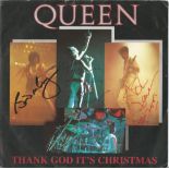 Fully signed Queen 45rpm record sleeve for Thank God it’s Christmas. Freddie has signed across his