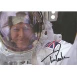 Astronaut Tim Peake signed 6 x 4 colour photo of him in Space Suit on EVA. Good Condition. We