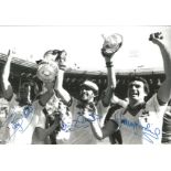 Trevor Brooking, David Cross and Billy Bonds West Ham Signed 12 x 8 inch football photo. Good