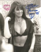 James Bond Caroline Munro signed sexy 10 x 8 b/w photo; she has added a kiss in pink lipstick to the