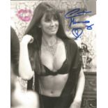 James Bond Caroline Munro signed sexy 10 x 8 b/w photo; she has added a kiss in pink lipstick to the