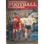 Vintage football Illustrated magazine signed to front page by many top players including Bobby