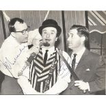 Eric Morecambe and Ernie Wise signed 8 x 6 inch music magazine photo with Aker Bilk. Good Condition.