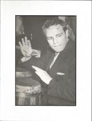 Marlon Brando signed b/w magazine photo to Connie mounted to an overall signed of 8 x 6 inches,