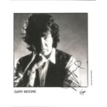 Gary Moore signed 10x8 black and white photo. Good Condition. All autographs are genuine hand signed